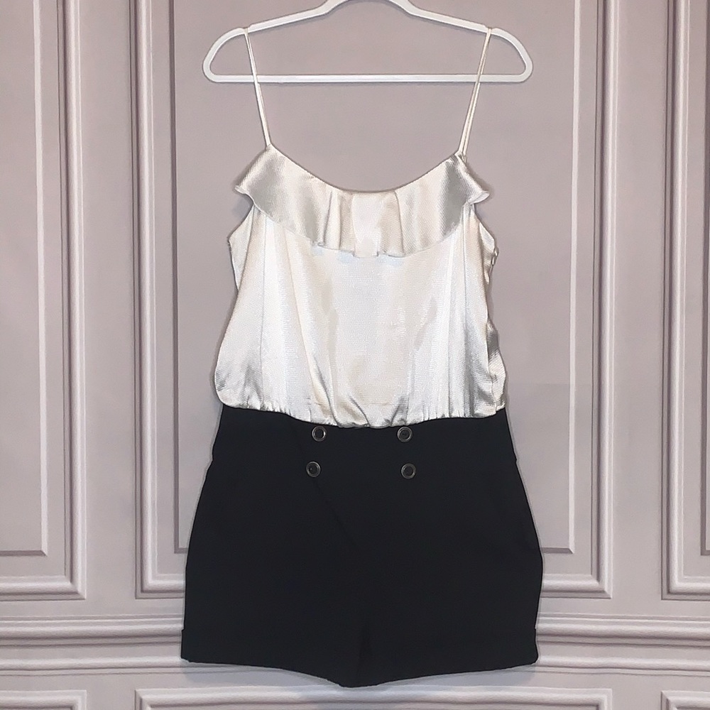 Size 13 Grass Collection romper. Adjustable straps